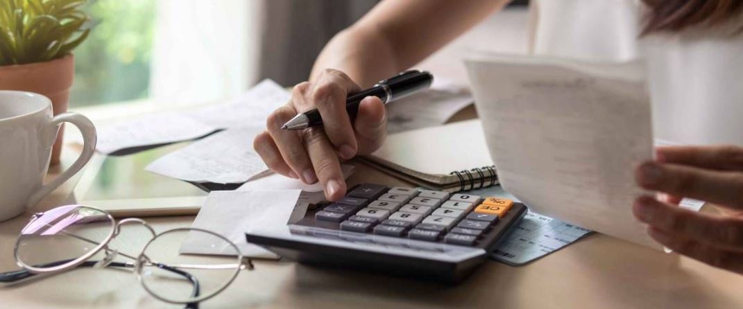 Woman on calculator