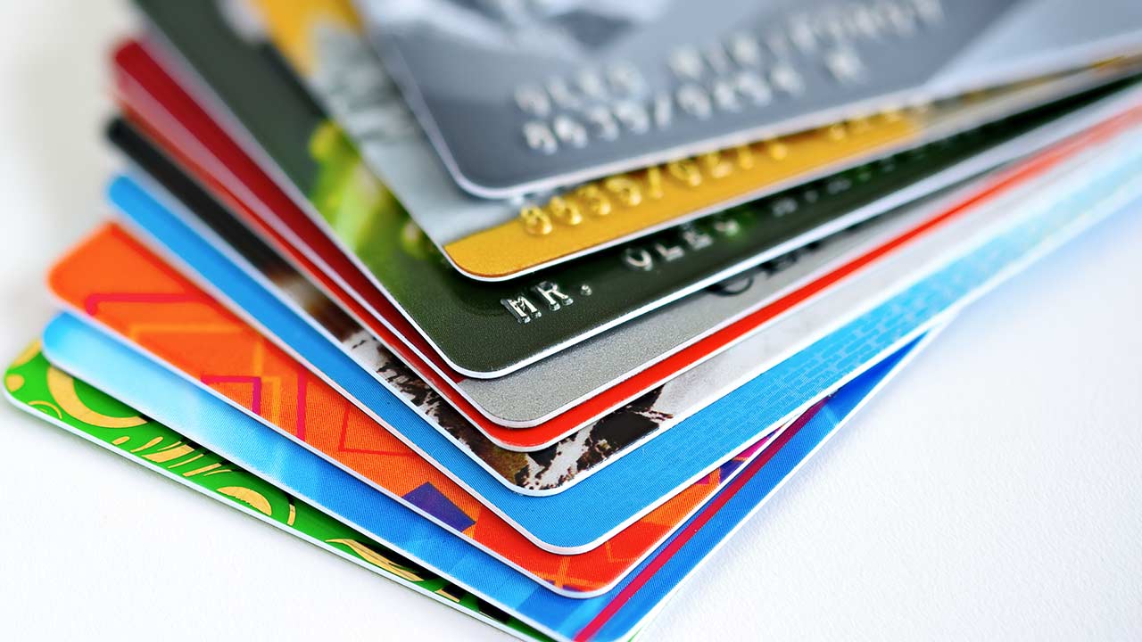 Various credit cards in a pile