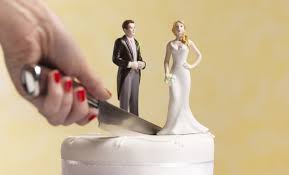 Knife slicing wedding cake figures