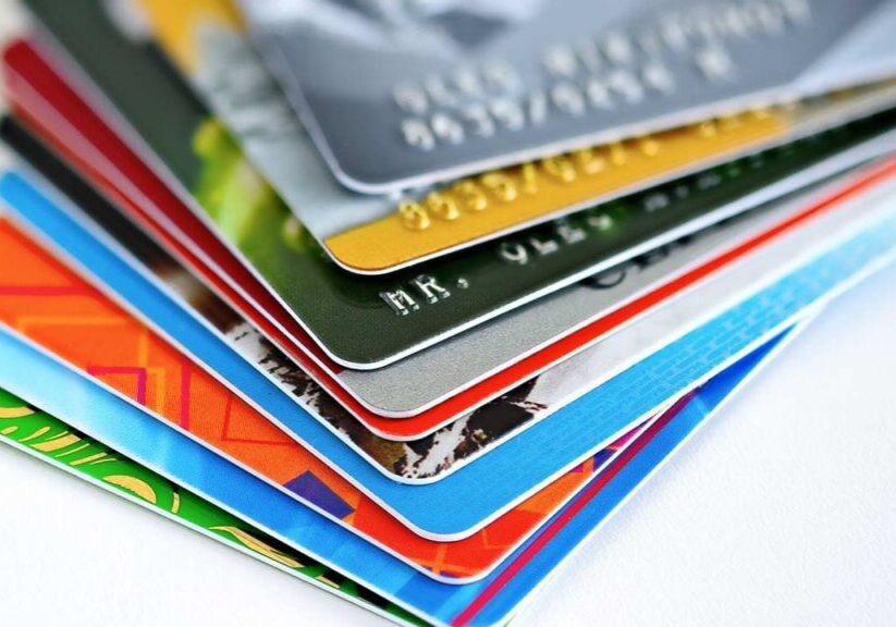 Various credit cards in a pile