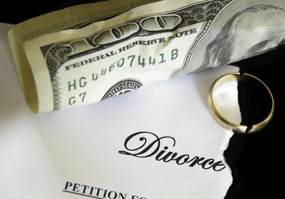 Divorce paperwork, cash, and gold ring