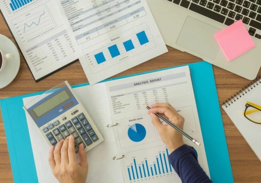 Business analysis with charts and laptop